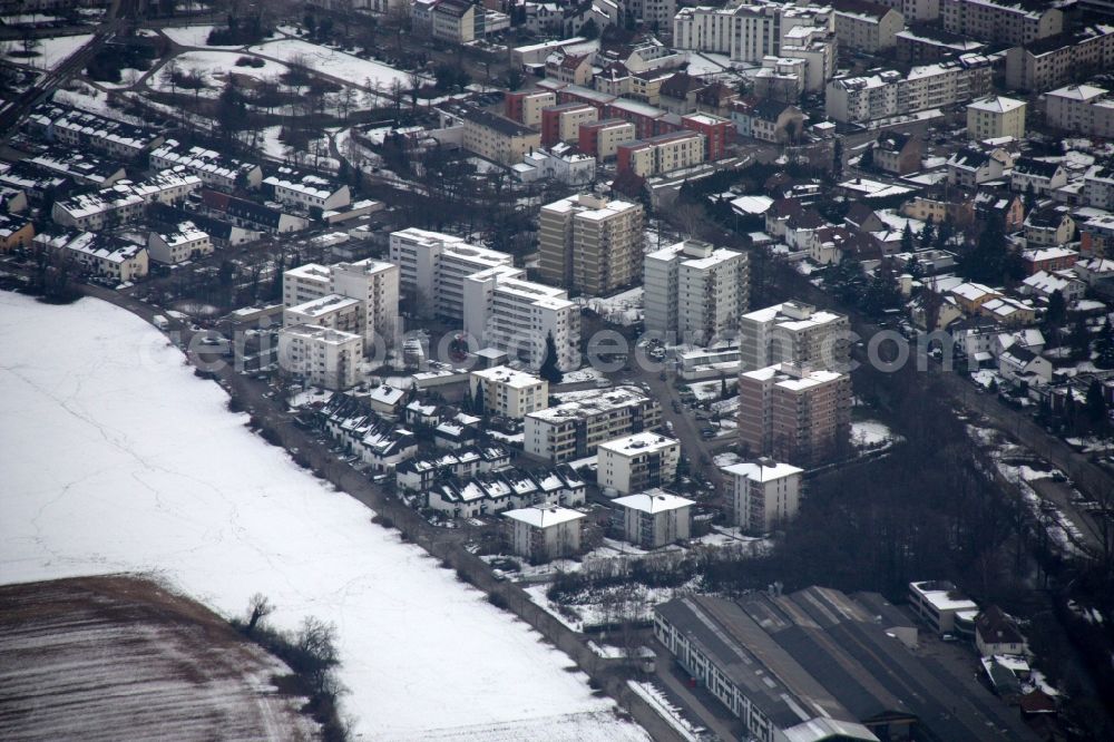 Aerial photograph Ettlingen - Wintry snowy Town View of the streets and houses of the residential areas in Ettlingen in the state Baden-Wuerttemberg
