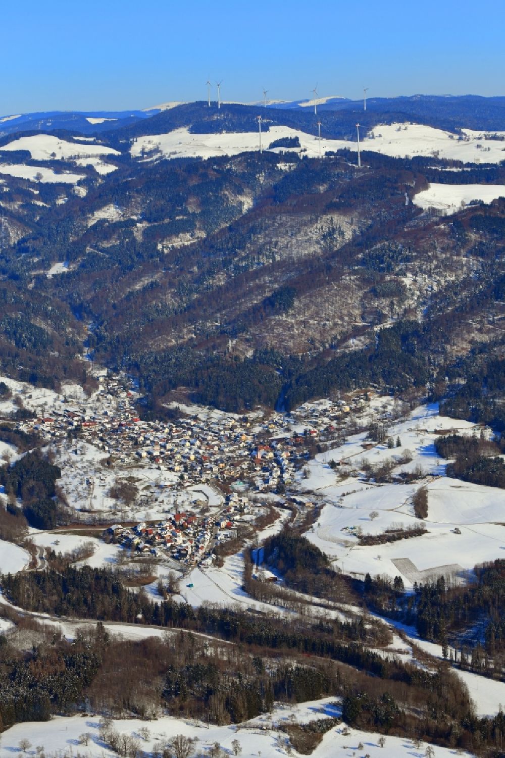Aerial photograph Hasel - Wintry snowy town view of the streets and houses of the residential areas of Hasel in the Black Forest in the state Baden-Wuerttemberg, Germany