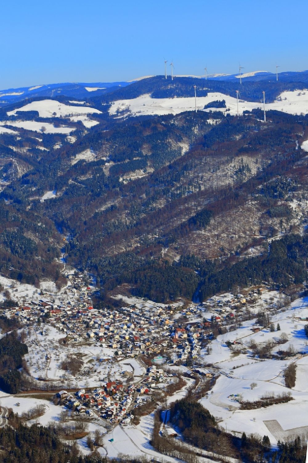 Hasel from above - Wintry snowy town view of the streets and houses of the residential areas of Hasel in the Black Forest in the state Baden-Wuerttemberg, Germany