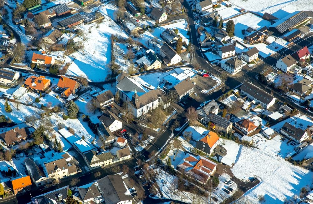 Voßwinkel from above - Wintey snowy Town View of the streets and houses of the residential areas in Vosswinkel in the state North Rhine-Westphalia