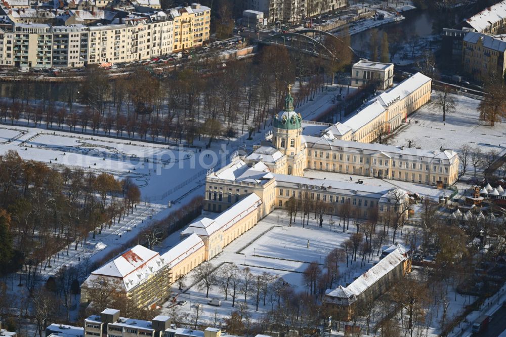 Aerial photograph Berlin - Wintry snowy palace on street Spandauer Damm in the district Charlottenburg in Berlin, Germany