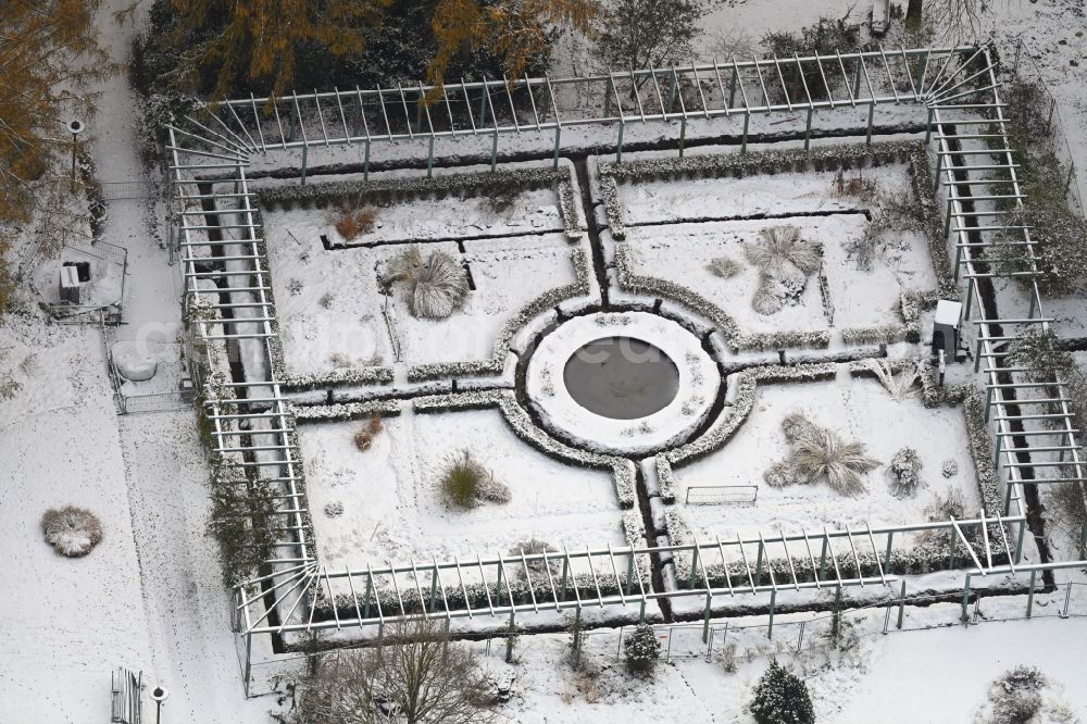 Aerial image Berlin - Wintry snowy park of Christlicher Garten in the district Marzahn in Berlin, Germany