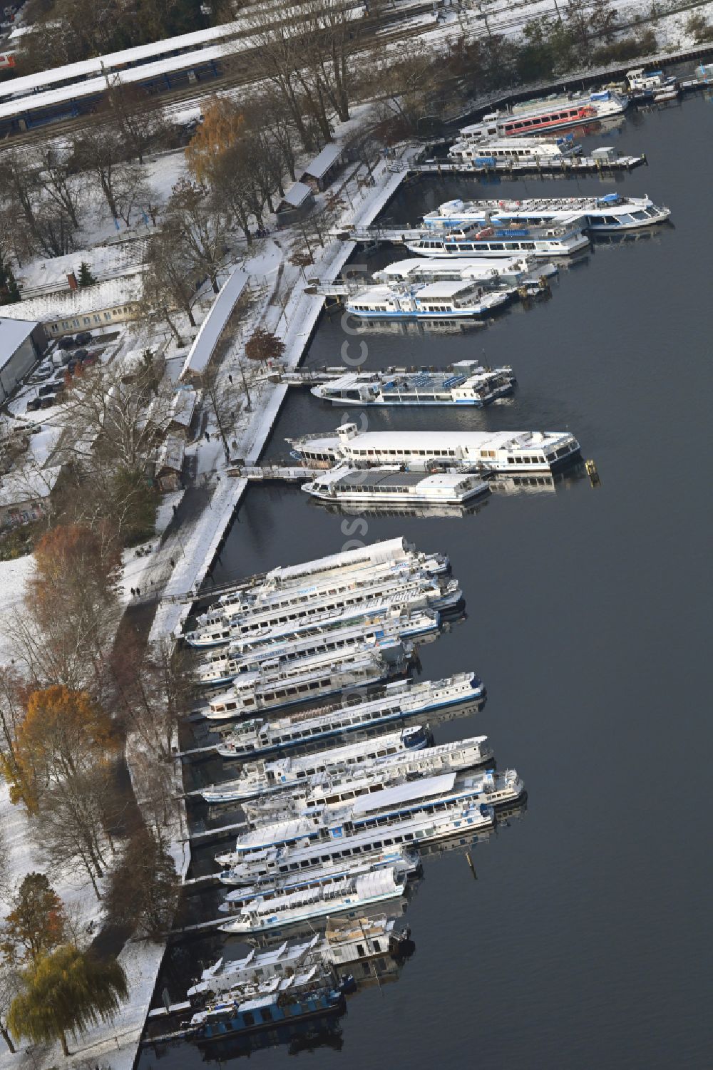 Aerial image Berlin - Wintry snowy passenger and passenger ship of the star and circle navigation GmbH at the port Puschkinallee Treptow in Berlin