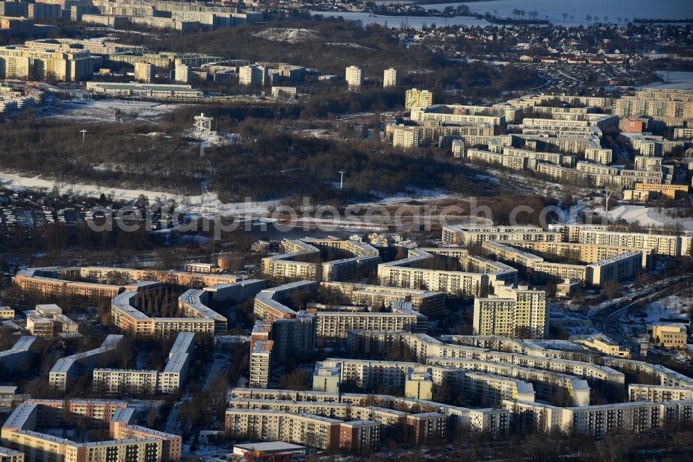 Berlin from above - Wintry snowy Skyscrapers in the residential area of industrially manufactured settlement in the district Hellersdorf in Berlin