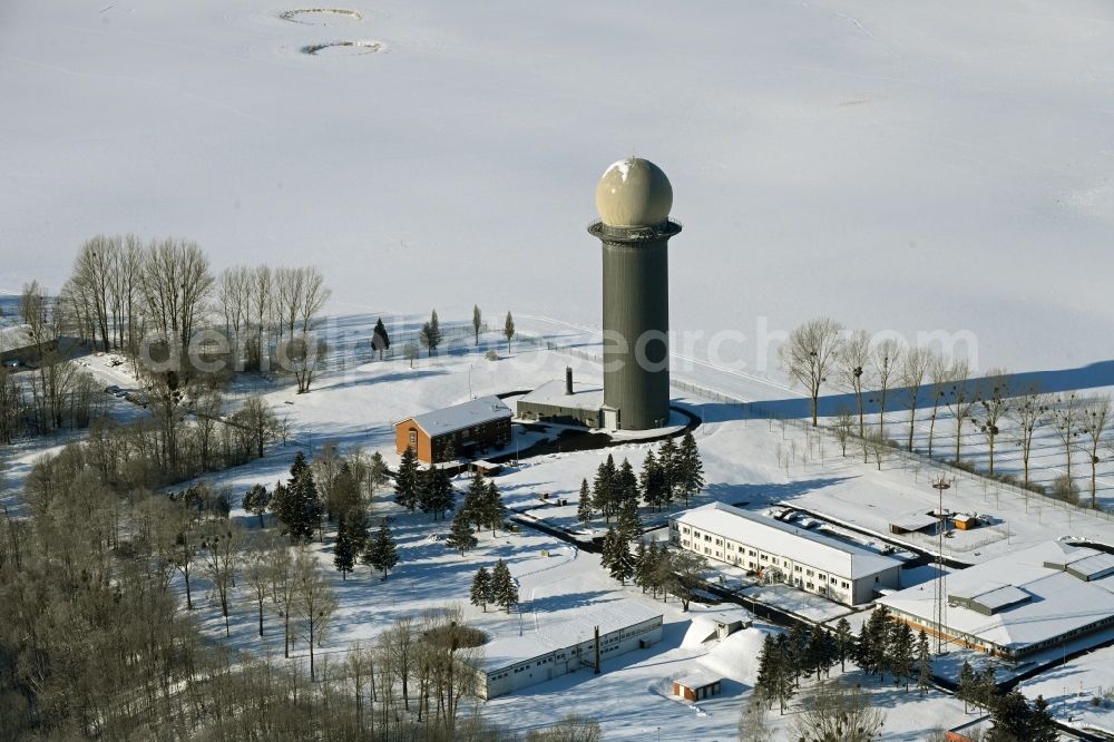 Cölpin from the bird's eye view: Wintry snowy radar Antenna Tower air traffic control in Coelpin in the state Mecklenburg - Western Pomerania, Germany
