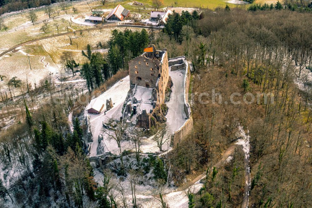 Seelbach from above - Wintry snowy ruins and vestiges of the former castle and fortress Burg Hohengeroldseck on Schlossberg in the district Schoenberg in Seelbach in the state Baden-Wurttemberg