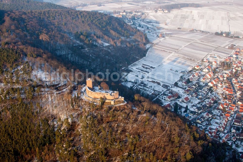 Klingenmünster from above - Wintry snowy Ruins and vestiges of the former castle and fortress Burg Landeck in Klingenmuenster in the state Rhineland-Palatinate, Germany