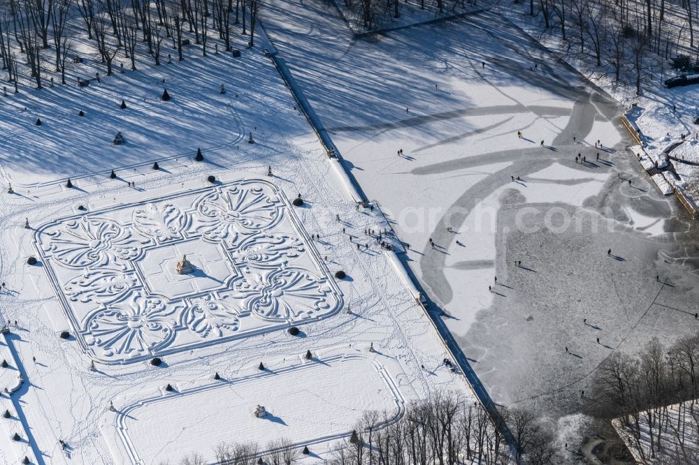 Aerial photograph Nordkirchen - Wintry snowy building complex in the park of the castle Schlosspark des Schloss Nordkirchen in Nordkirchen in the state North Rhine-Westphalia, Germany