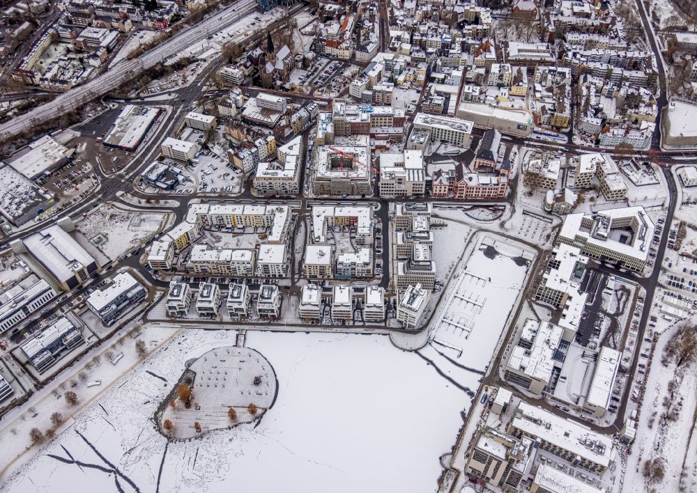 Dortmund from the bird's eye view: Wintry snowy lake Island Kulturinsel on the Phoenixsee on street Am Kai in Dortmund at Ruhrgebiet in the state North Rhine-Westphalia