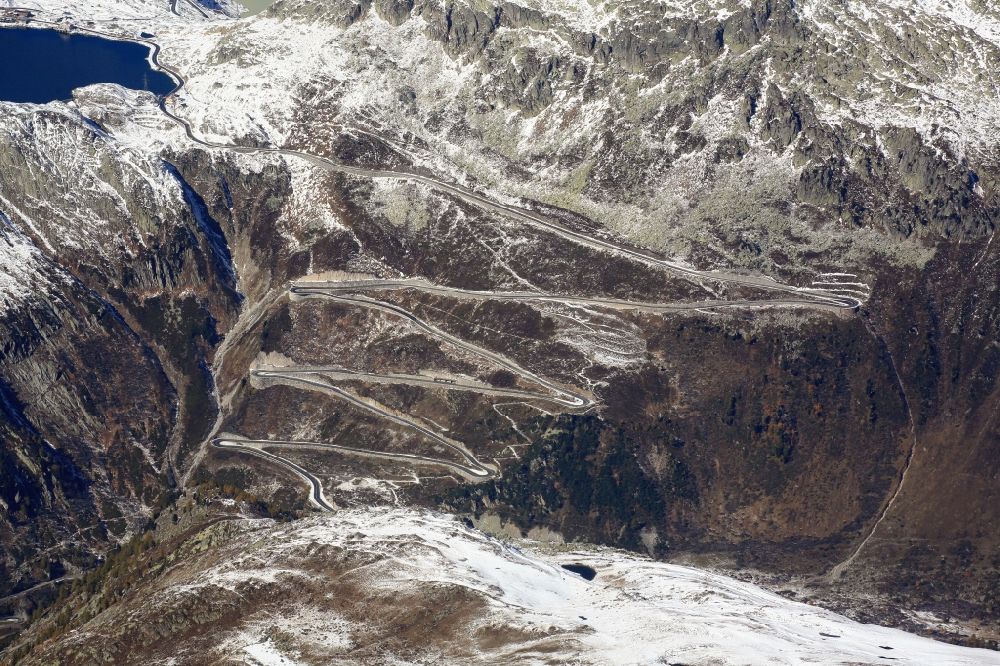 Aerial image Obergoms VS - Wintry snowy road curves at the Grimmselpass and Totensee in Obergoms VS Wallis, Schweiz