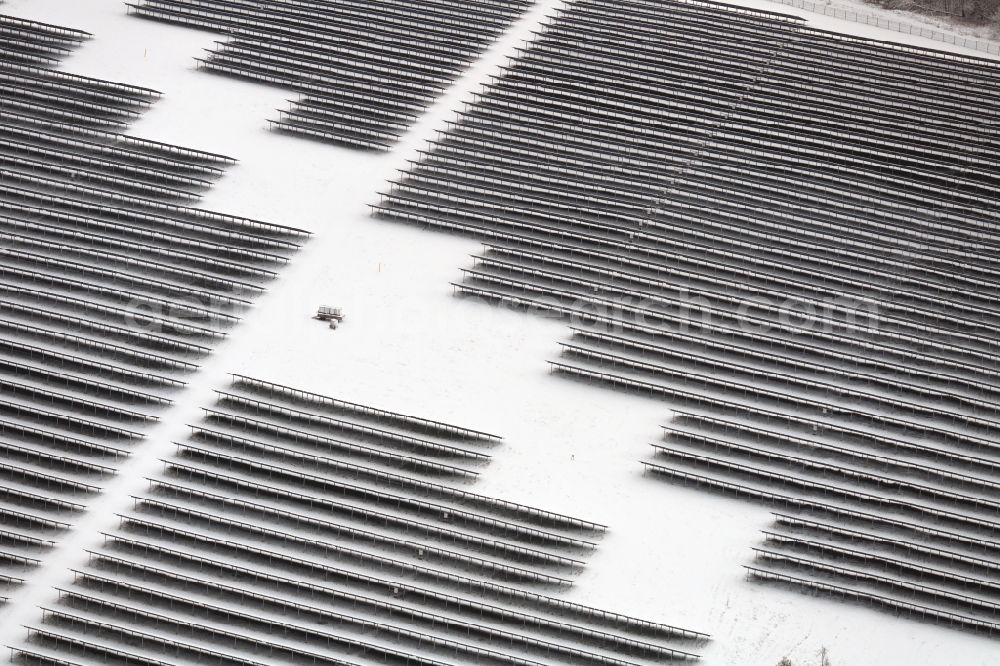 Willmersdorf from above - Wintry snowy solar park and solar power plant Solarpark Weesow-Willmersdorf in Willmersdorf in the state Brandenburg, Germany
