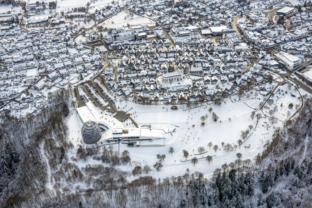 Aerial photograph Winterberg - Wintry snowy city view on down town in Winterberg at Sauerland in the state North Rhine-Westphalia, Germany