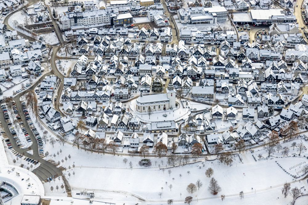 Winterberg from above - Wintry snowy city view on down town in Winterberg at Sauerland in the state North Rhine-Westphalia, Germany