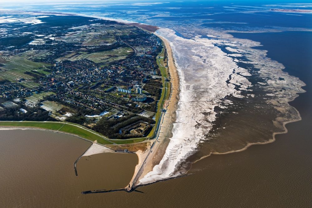 Aerial photograph Cuxhaven - Wintry snowy view of the spa quarters of Doese on the coast of North and Wadden Sea in Cuxhaven in the state of Lower Saxony