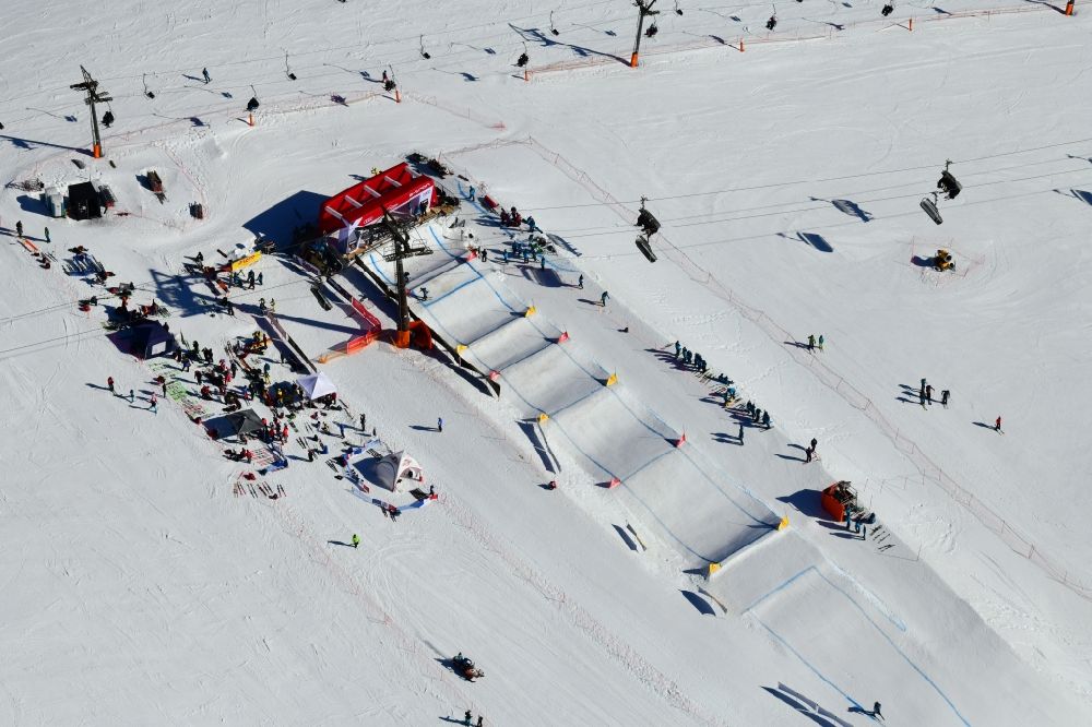 Feldberg (Schwarzwald) from above - Wintry snowy landscape with the start area for the World Cup Ski Cross at the ski sports area Seebuck on the Feldberg mountain in Feldberg (Schwarzwald) in the state Baden-Wurttemberg, Germany