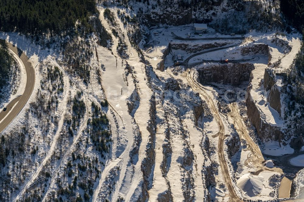 Aerial photograph Seebach - Wintry snowy quarry for the mining and handling of Granit in Seebach in the state Baden-Wurttemberg, Germany