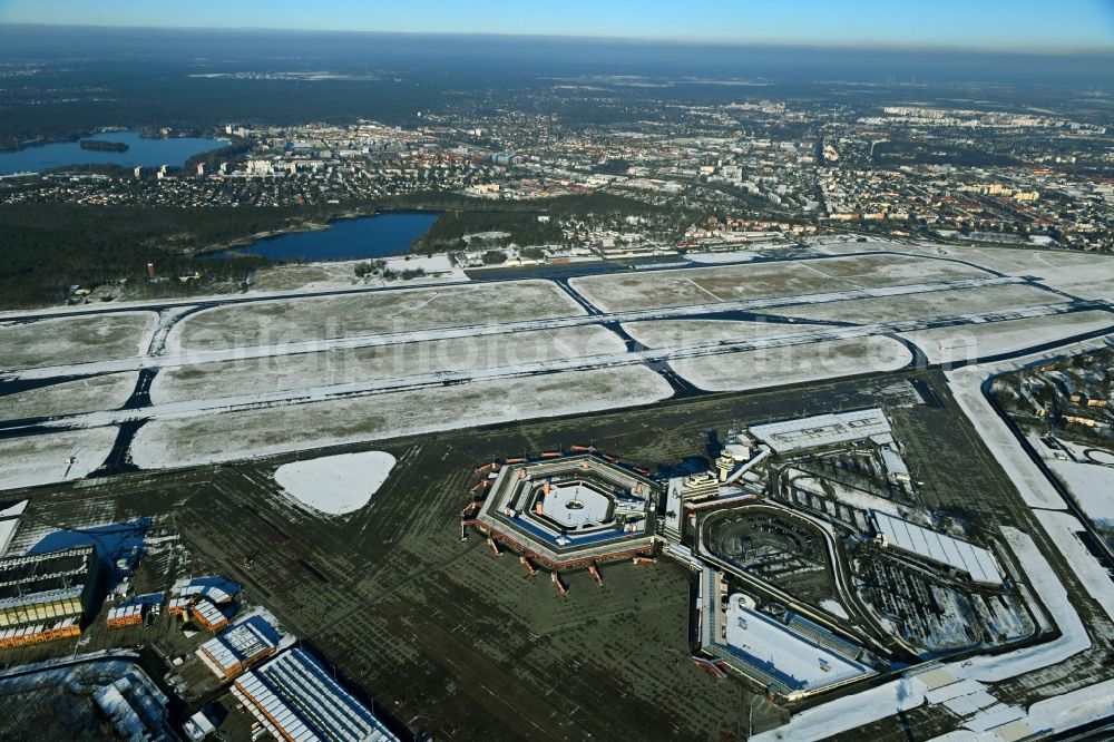 Aerial image Berlin - Wintry snowy end of flight operations at the terminal of the airport Berlin - Tegel