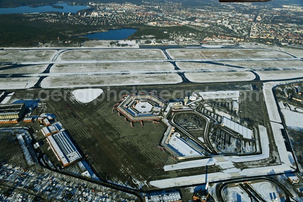 Berlin from above - Wintry snowy end of flight operations at the terminal of the airport Berlin - Tegel