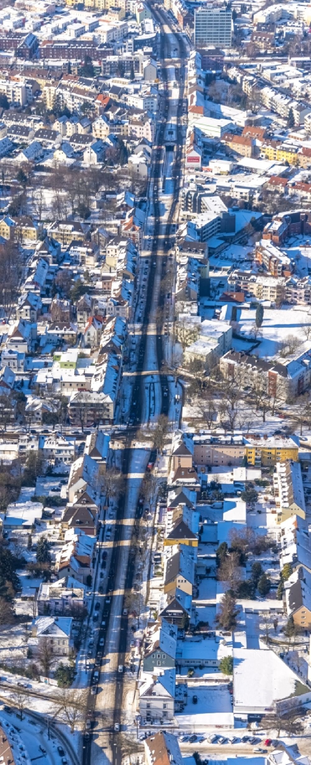 Bochum from the bird's eye view: Wintry snowy street - road guidance of Wittener Strasse in the district Altenbochum in Bochum in the state North Rhine-Westphalia, Germany
