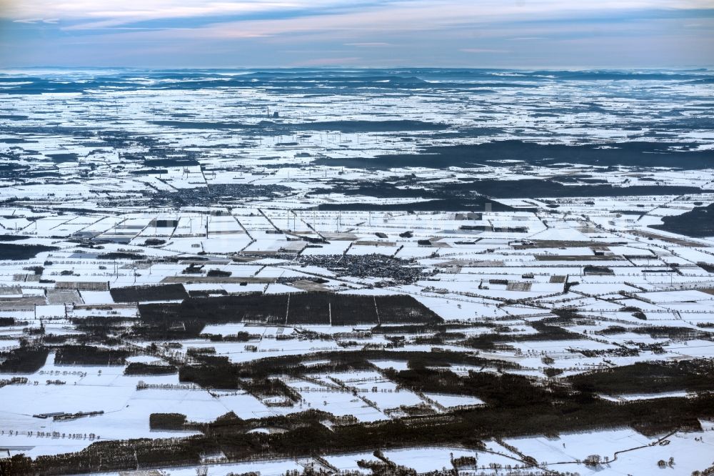 Hoyershausen from above - Wintry snowy structures on agricultural fields in Hoyershausen in the state Lower Saxony, Germany