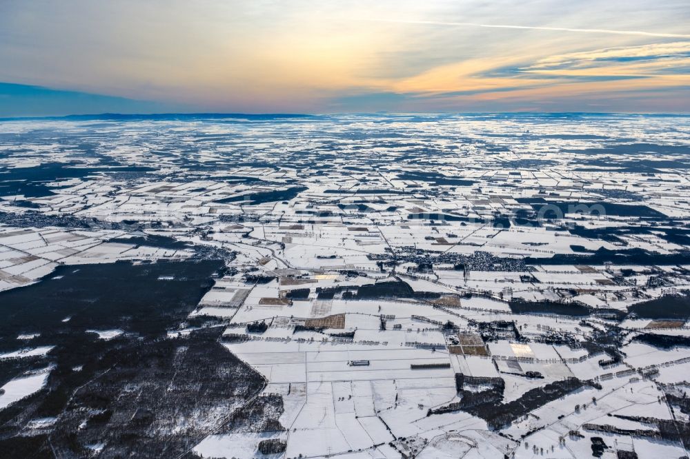 Aerial image Hoyershausen - Wintry snowy structures on agricultural fields in Hoyershausen in the state Lower Saxony, Germany