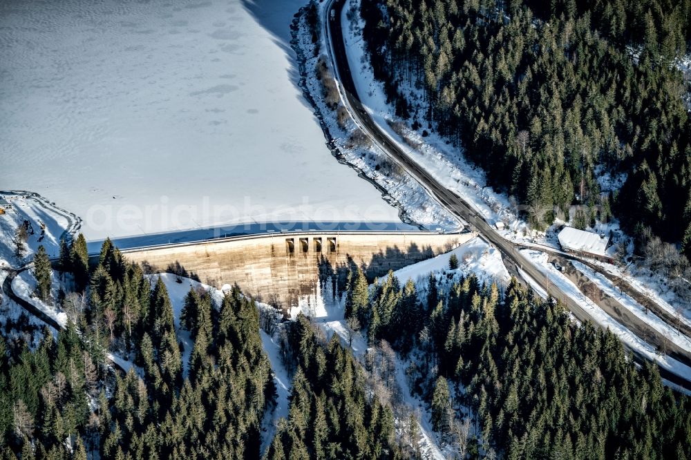 Blasiwald from above - Wintry snowy dam and shore areas at the lake Schluchsee in Blasiwald in the state Baden-Wurttemberg, Germany