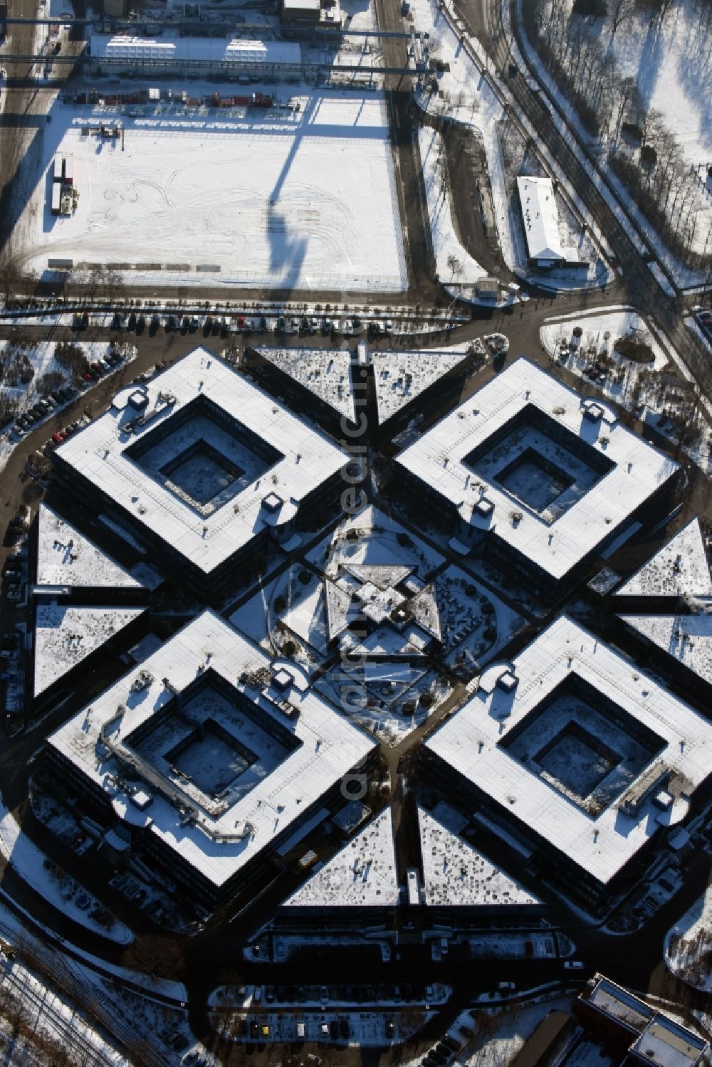 Hennigsdorf from above - Wintry snowy grounds of the Blue Wonder Technology Center in Hennigsdorf in Brandenburg. The technology park Hennigsdorf North offers a business park land for commercial, industrial, service and production