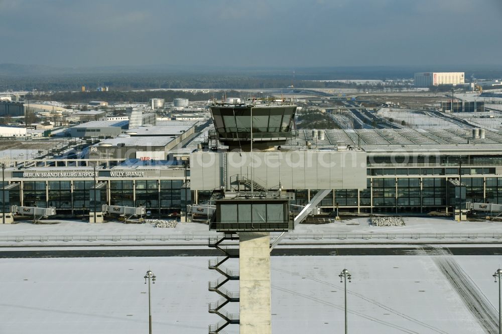 Aerial image Schönefeld - Wintry snowy tower of DFS German Air Traffic Control GmbH on the runways of the BER Airport in Schoenefeld in Brandenburg