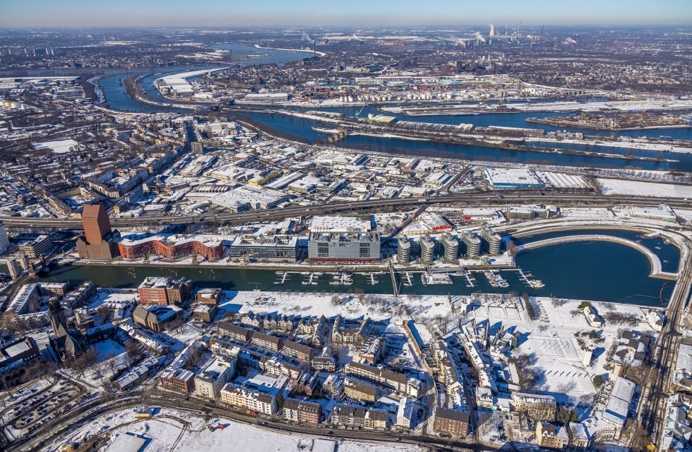 Aerial image Duisburg - Wintry snowy administration building of WDR television, the health insurance Novitas BKK and the police department at the yavht harbour Marina in Duisburg at Ruhrgebiet in the state North Rhine-Westphalia