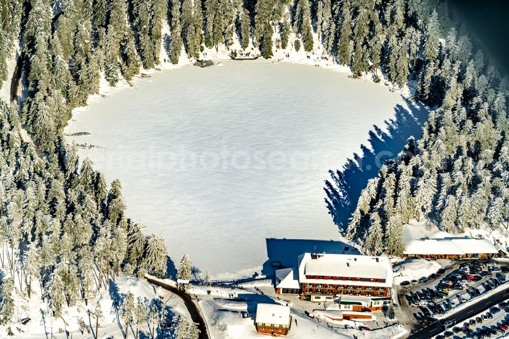 Aerial photograph Seebach - Wintry snowy forests on the shores of Lake Mumelsee in Seebach in the state Baden-Wurttemberg, Germany