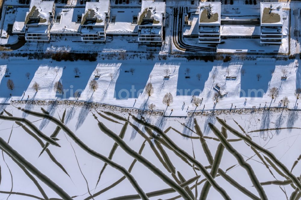 Dortmund from above - Wintry snowy traces on the frozen and ice-covered water surface Phoenix-See in the district Hoerde in Dortmund at Ruhrgebiet in the state North Rhine-Westphalia, Germany