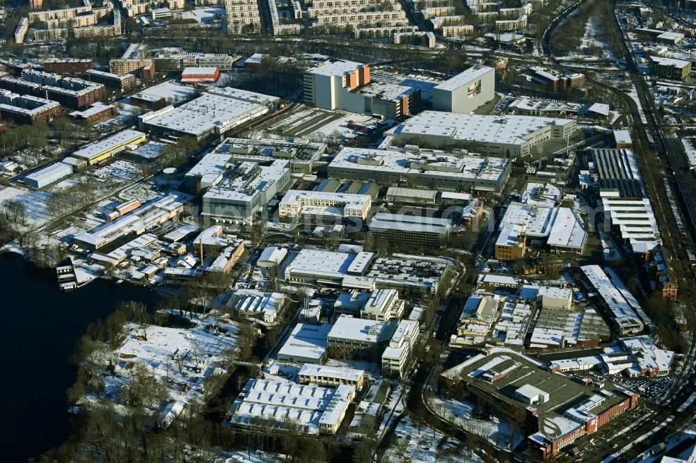 Aerial photograph Berlin - Wintry snowy factory area of the Bayerische Motoren Werke / BMW AG motorcycle plant at the Juliusturm in the district of Spandau in Berlin, Germany