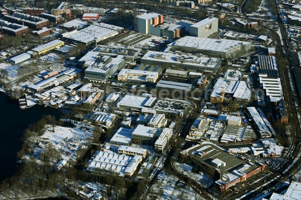Berlin from above - Wintry snowy factory area of the Bayerische Motoren Werke / BMW AG motorcycle plant at the Juliusturm in the district of Spandau in Berlin, Germany