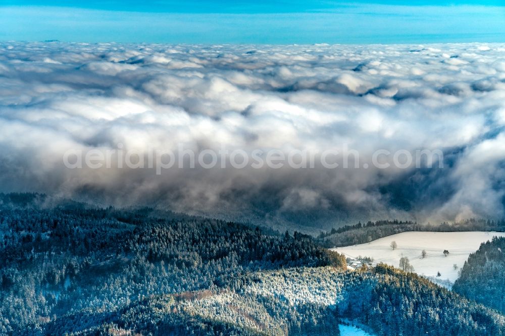 Aerial image Baiersbronn - Wintry snowy weather with layered fog cover in Schwarzwald in Baiersbronn in the state Baden-Wurttemberg, Germany