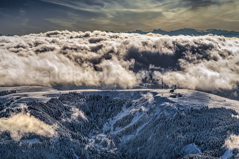 Feldberg (Schwarzwald) from the bird's eye view: Wintry snowy weather conditions with cloud formation on Schwarzwald in Feldberg (Schwarzwald) in the state Baden-Wurttemberg, Germany