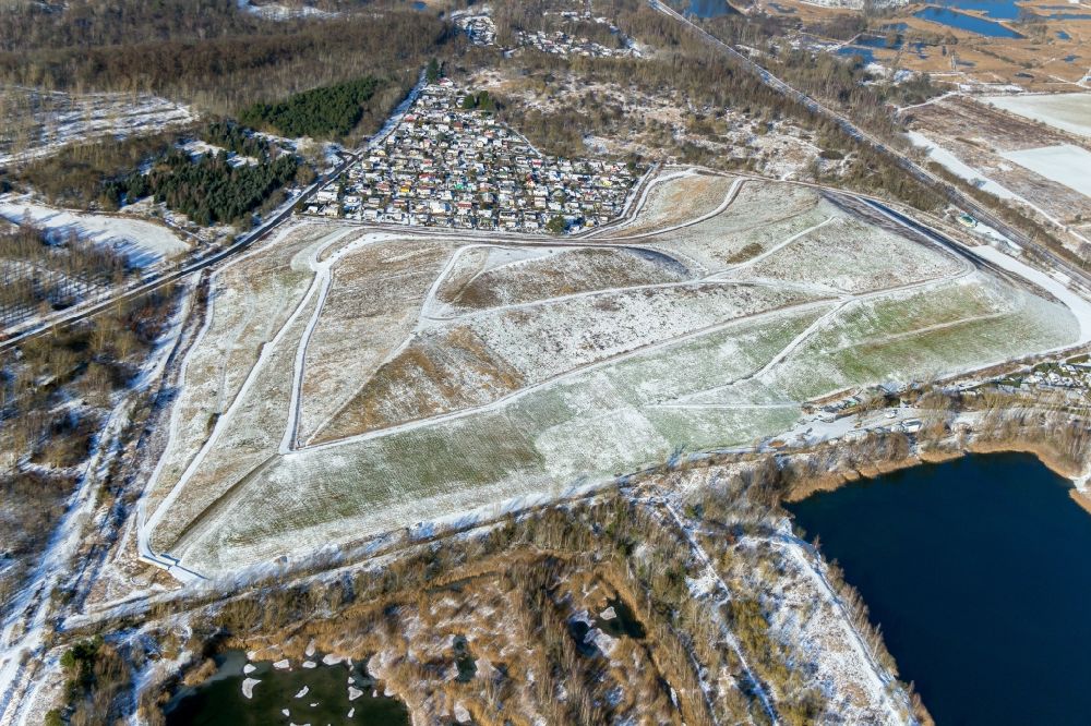 Aerial photograph Berlin - Wintry snowy wintry snowy site of heaped landfill in Berlin in Germany