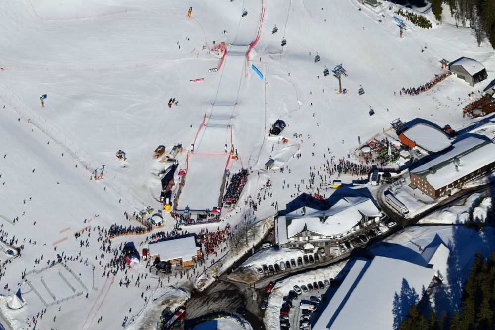 Aerial image Feldberg (Schwarzwald) - Wintry snowy landscape with the finish area and tribune for the World Cup Ski Cross at the ski sports area Seebuck on the Feldberg mountain in Feldberg (Schwarzwald) in the state Baden-Wurttemberg, Germany