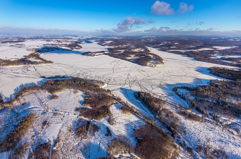 Möhnesee from above - Winter snow-covered and frozen Moehnesee in the state North Rhine-Westphalia, Germany