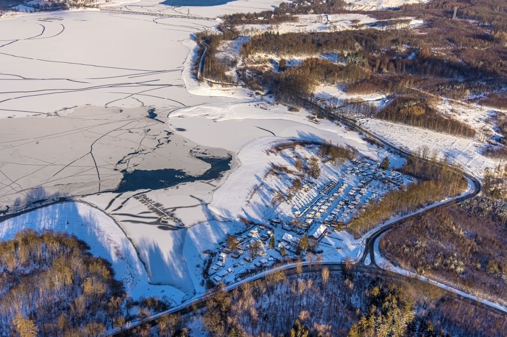 Aerial image Möhnesee - Winter snow-covered and frozen Moehnesee in the state North Rhine-Westphalia, Germany