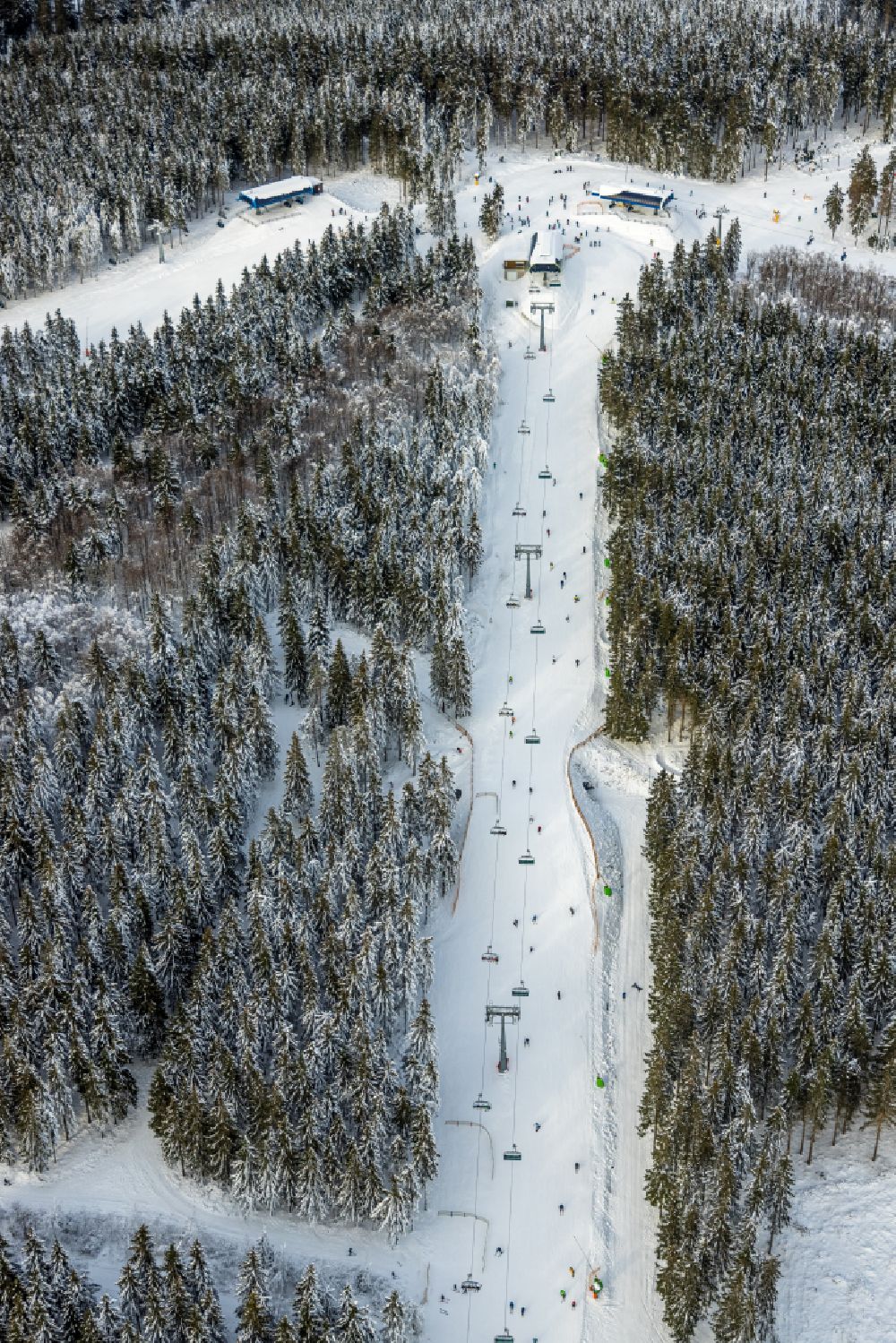 Aerial image Winterberg - Aisle and downhill slope in the winter sports ski area on street Am Waltenberg in Winterberg at Sauerland in the state North Rhine-Westphalia, Germany