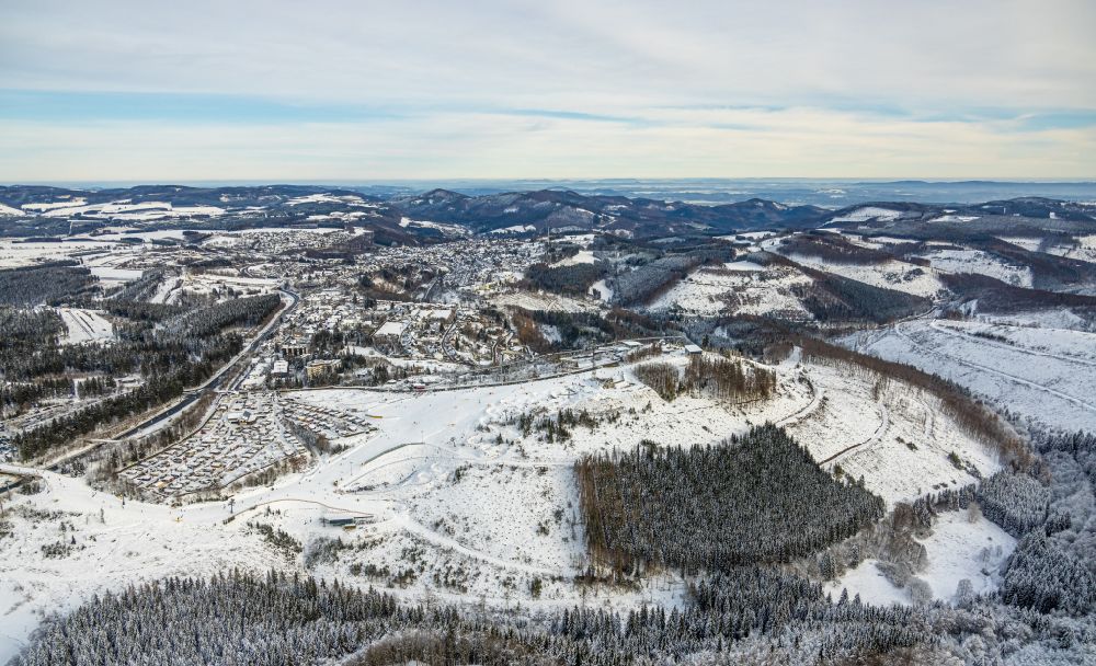 Winterberg from the bird's eye view: Aisle and downhill slope in the winter sports ski area on street Am Waltenberg in Winterberg at Sauerland in the state North Rhine-Westphalia, Germany
