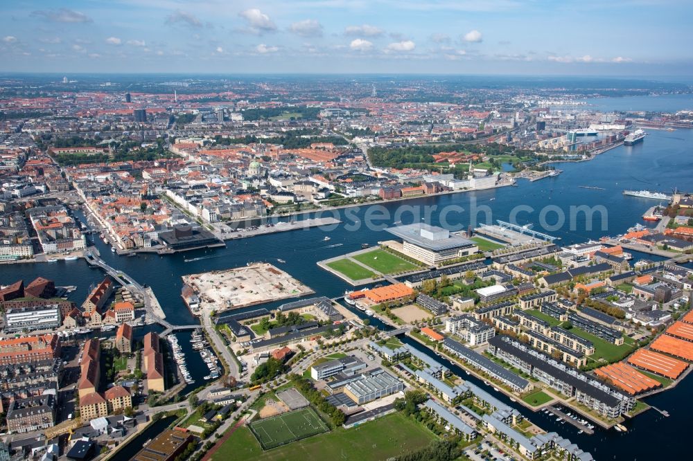 Kopenhagen from the bird's eye view: Residential and commercial building in the development area on the quayside of the former port in the district Indre By in Copenhagen in Region Hovedstaden, Denmark