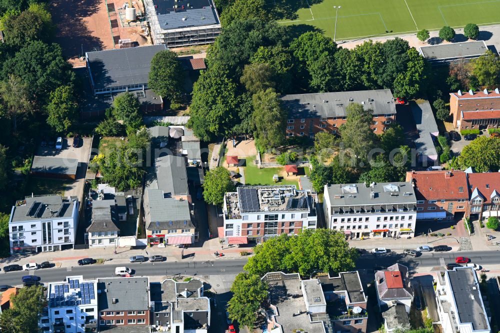 Hamburg from the bird's eye view: Residential and commercial building on street Frohmestrasse in the district Schnelsen in Hamburg, Germany