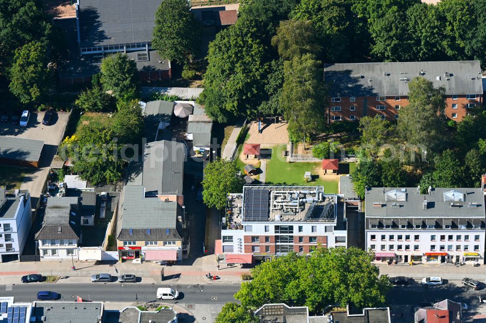 Aerial image Hamburg - Residential and commercial building on street Frohmestrasse in the district Schnelsen in Hamburg, Germany