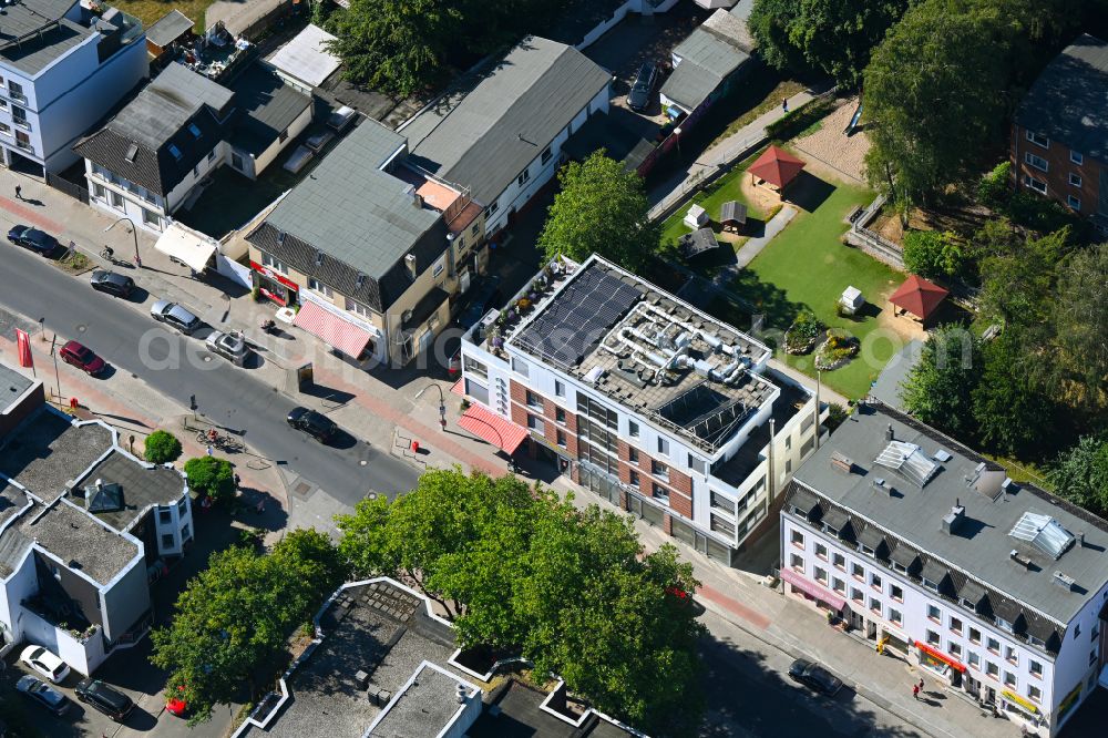 Hamburg from the bird's eye view: Residential and commercial building on street Frohmestrasse in the district Schnelsen in Hamburg, Germany