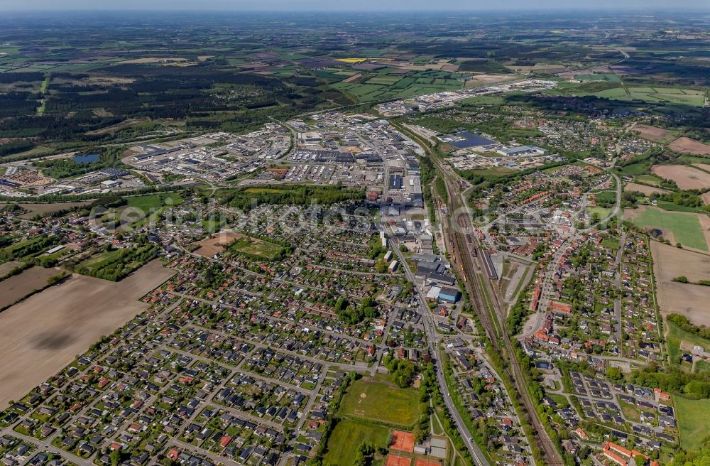 Aerial image Padborg - Residential and commercial areas along the rails at the passenger and freight station in Padborg in Syddanmark, Denmark