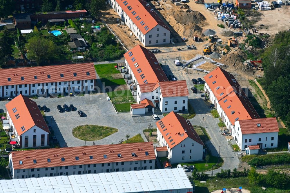 Aerial photograph Berlin - Construction site Gutshof Falkenberg for the multi-family residential building Dorfstrasse corner Hausvaterweg in the district Falkenberg in Berlin, Germany