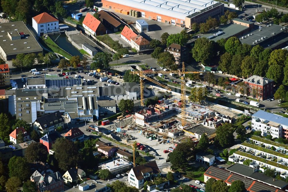 Augsburg from the bird's eye view: Construction site to build a new multi-family residential complex KULT.QUARTIER WOHNEN AM PROVIANTBACH in the district Am Schaefflerbach in Augsburg in the state Bavaria, Germany