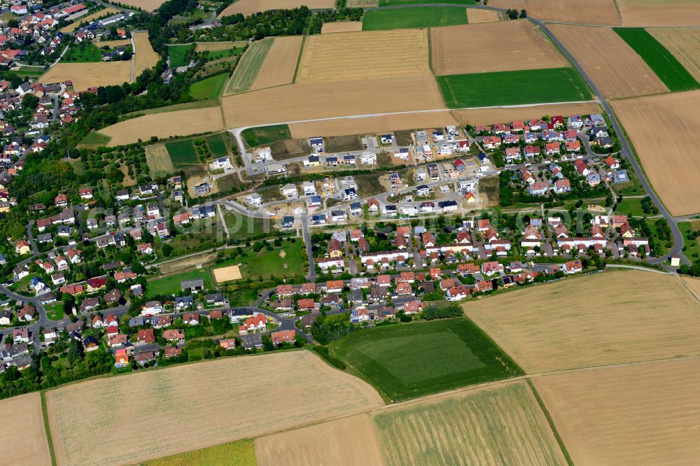 Aerial image Estenfeld - Single-family residential area of settlement on the edge of agricultural fields in Estenfeld in the state Bavaria, Germany