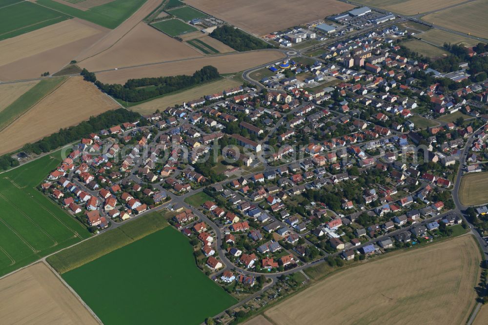 Aerial image Giebelstadt - Single-family residential area of settlement on the edge of agricultural fields in Giebelstadt in the state Bavaria, Germany